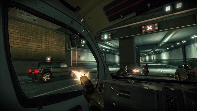 Inside a car, taking on bikies in the PlayStation VR game <i>The London Heist</i>