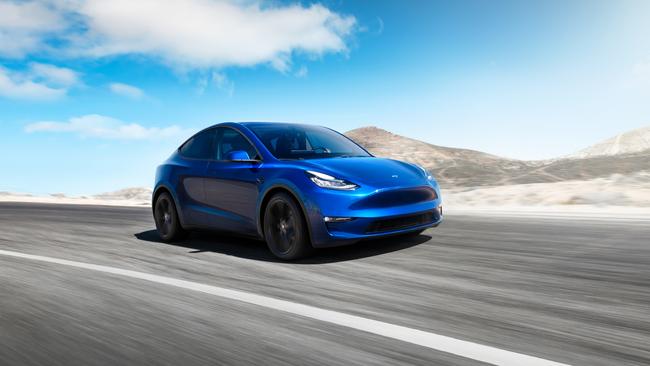 A Tesla Model Y … Labor’s National Electric Vehicle policy will need federally-funded road upgrades to have electric vehicle charging infrastructure.