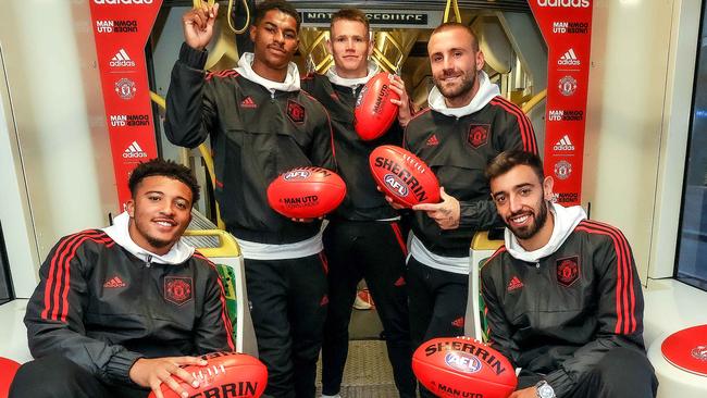 Manchester United stars Jadon Sancho, Marcus Rashford, Scott McTominay, Luke Shaw and Bruno Fernandez on-board a tram in Melbourne. Picture: Ian Currie