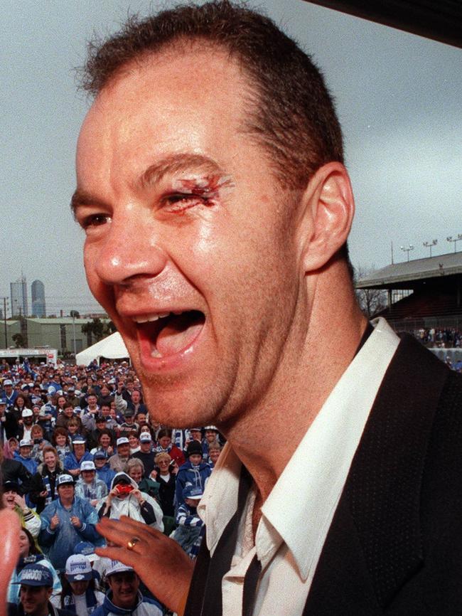 Darren Crocker at Arden Street after the 1996 Grand Final.