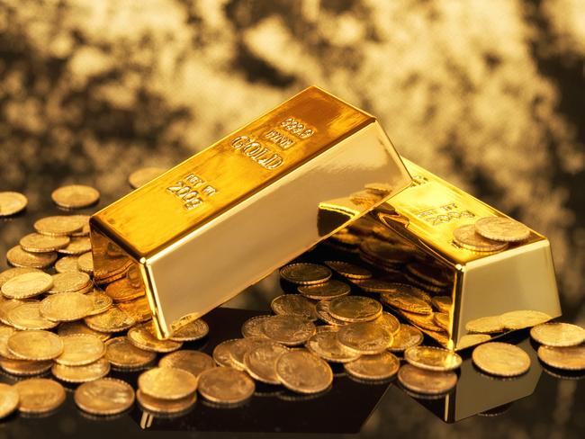 Gold bars and gold coins for wealth