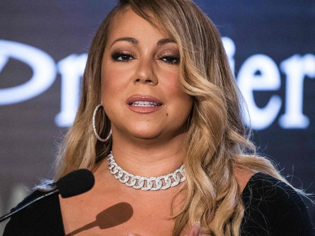 CORRECTION - US Singer Mariah Carey speaks at a press conference to announce an agreement with Israeli cosmetics brand Premier Dead Sea, in the coastal city of Tel Aviv on June 26, 2017. / AFP PHOTO / JACK GUEZ / “The erroneous mention[s] appearing in the metadata of this photo by JACK GUEZ has been modified in AFP systems in the following manner: [Dead Sea] instead of [Red Sea]. Please immediately remove the erroneous mention[s] from all your online services and delete it (them) from your servers. If you have been authorized by AFP to distribute it (them) to third parties, please ensure that the same actions are carried out by them. Failure to promptly comply with these instructions will entail liability on your part for any continued or post notification usage. Therefore we thank you very much for all your attention and prompt action. We are sorry for the inconvenience this notification may cause and remain at your disposal for any further information you may require.”