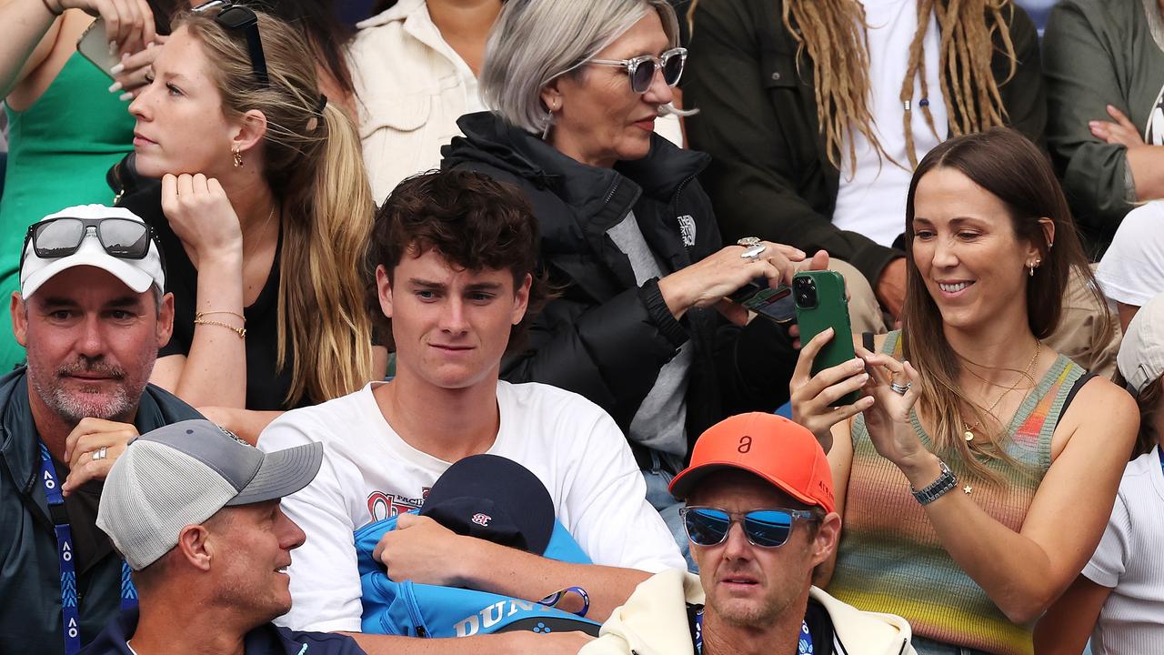 Dad Lleyton (bottom left) and mum Bec (top right) were in the stands. (Photo by Darrian Traynor/Getty Images)