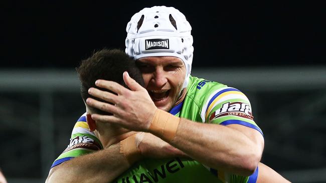 Nick Cotric of the Raiders celebrates with team mate Jarrod Croker after scoring a try against the Eels.