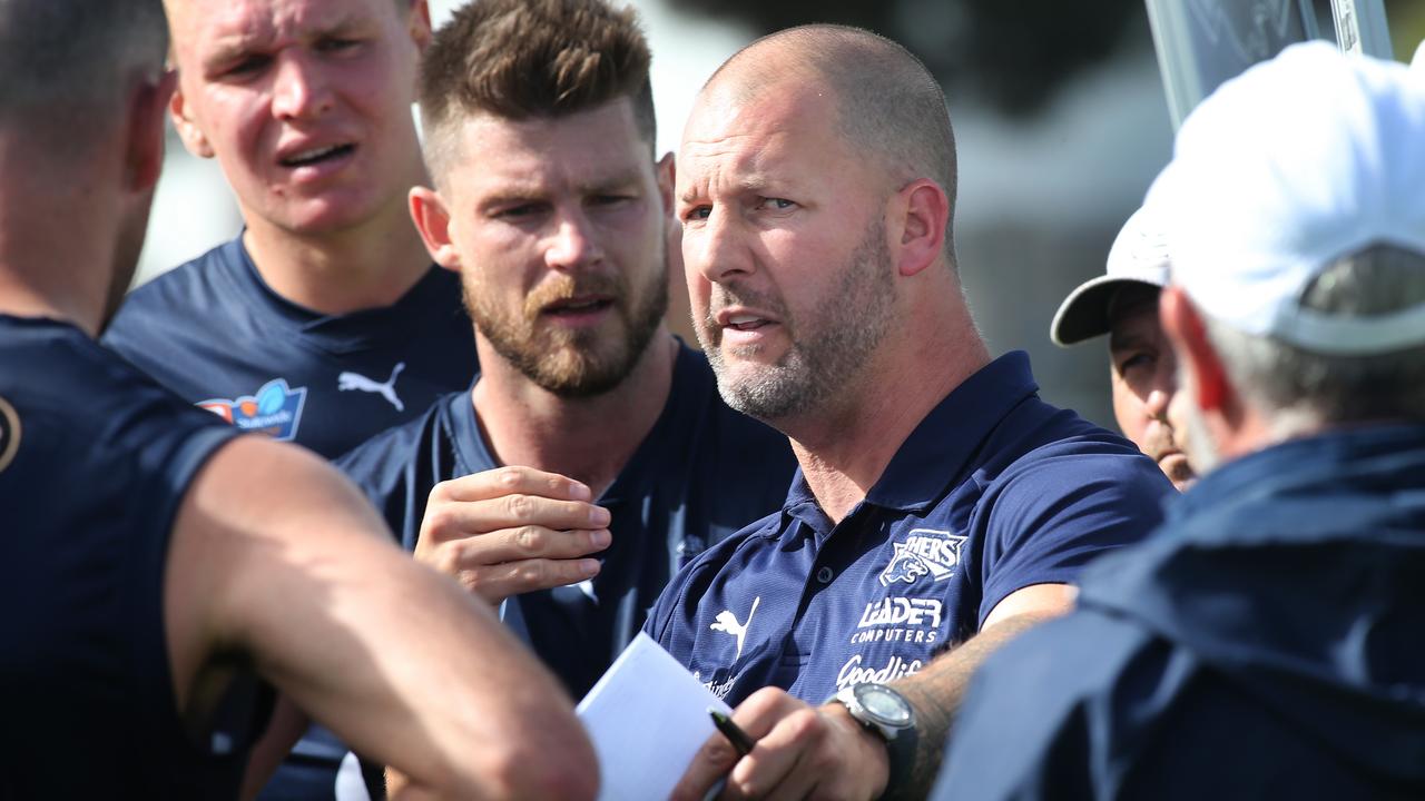 South Adelaide coach Jarrad Wright addresses his players during Saturday’s physical clash against North Adelaide. Picture: Dean Martin