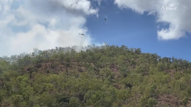 Helicopters battle fires at Nome