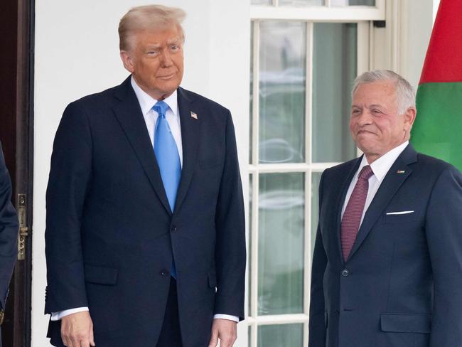 US President Donald Trump greets Jordanâs King Abdullah II (R) and Jordanâs Crown Prince Hussein (L) as they arrive for a meeting at the West Wing of the White House in Washington, DC, February 11, 2025. (Photo by SAUL LOEB / AFP)