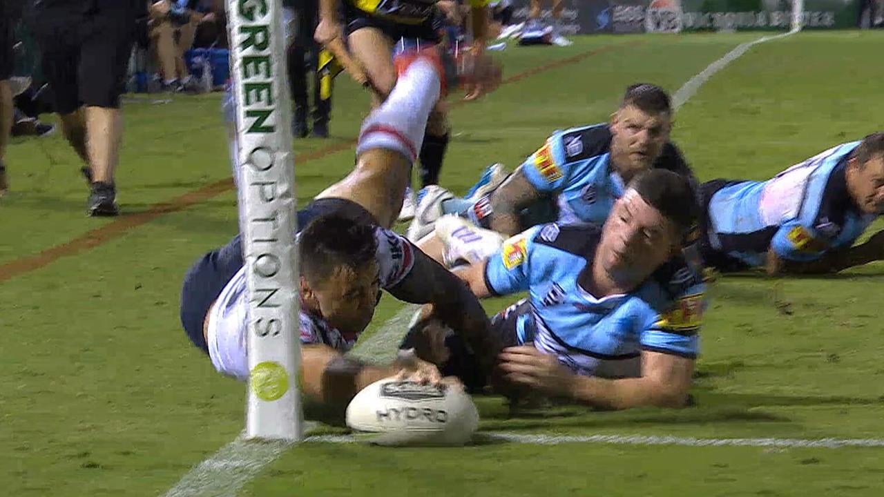 Matt Ikuvalu scores an inch perfect try in the corner against the Sharks.