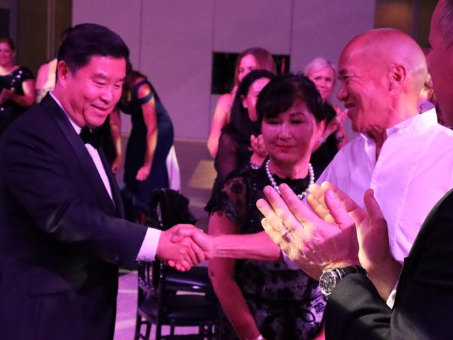 Yoo Chan Kim and his wife Hyun Ja with Dr Charlie Teo at the fundraising ball in which Kim pledged $1 million to the Charlie Teo Foundation charity.