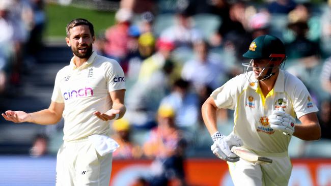 England's paceman Chris Woakes shows his frustration.