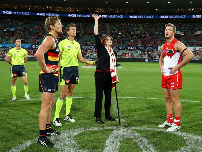 Sydney Swans Ambassador Cynthia Banham tosses the coin ahead of the round two AFL match between the Sydney Swans and the Adelaide Crows. Picture: Cameron Spencer/AFL Media/Getty Images