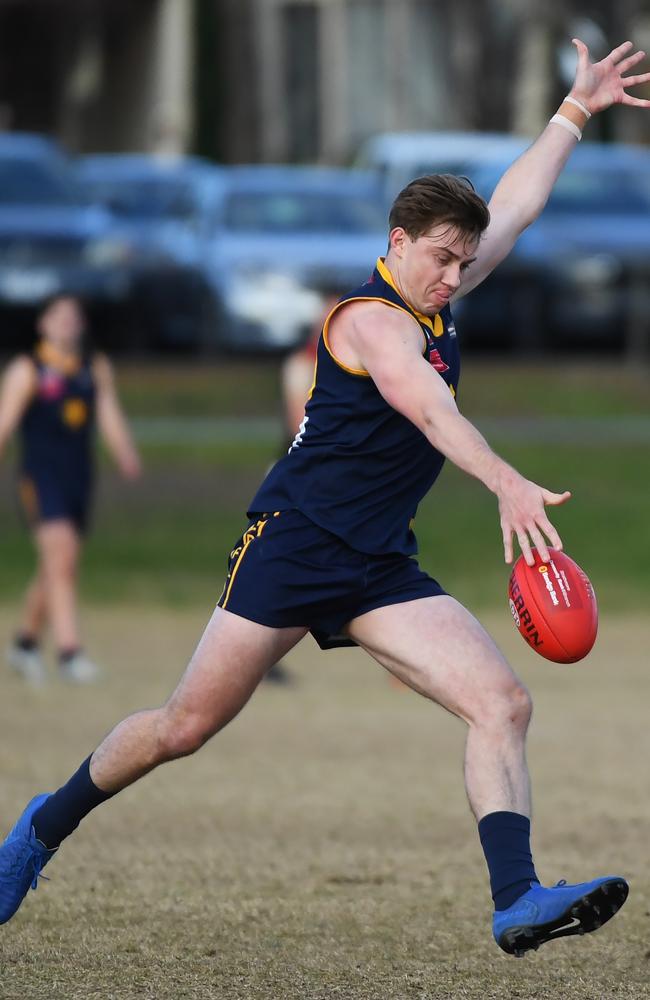 Charles Lill has a shot at goal for Essendon Doutta Stars. Picture: James Ross.