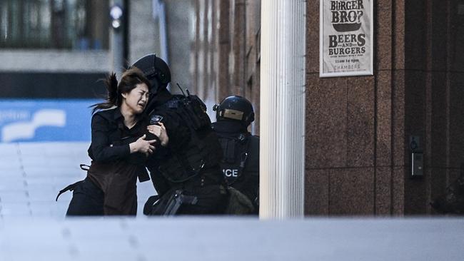 Tactical police at the Lindt cafe in Sydney's Martin Place during the siege. Picture: Chris McKeen