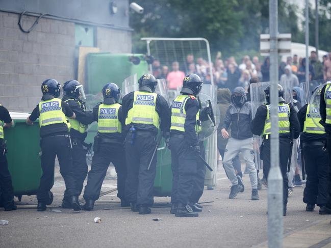 Riot police clash with far-right protesters amid widespread violence across the UK. Picture: Getty Images