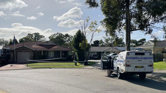 NSW Police set up a crime scene at Taubman Drive, Horningsea Park, after a stabbing.