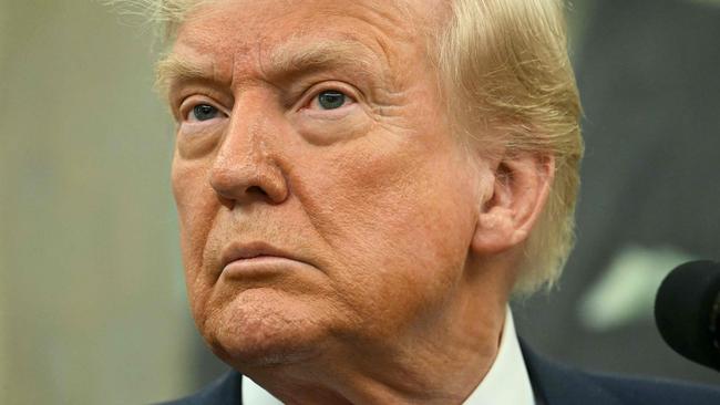 US President Donald Trump speaks during a swearing-in ceremony for the Ambassador to China, former Republican Senator of Georgia, David Perdue at the White House in Washington, DC, May 7, 2025. (Photo by Jim WATSON / AFP)