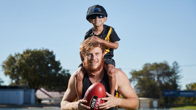 Glenelg footballer Josh Scott will shave his head for Enzo Cornejo, who was born with a rare condition called progeria. Picture: Matt Loxton