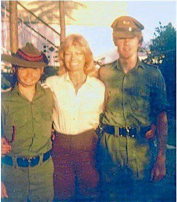 In their cadet uniforms Ben and Michael Whitten with their mother Sandra Whitten in Mackay in the 1980s. Picture: Contributed