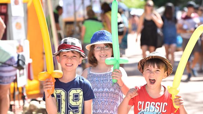 Urangan Pier Park Community Markets is offering an Australian themed market this Australia Day. Pictured: (L) Marcos,6, Ella,7, and Ashley,4, Woods enjoying a visit to the market.