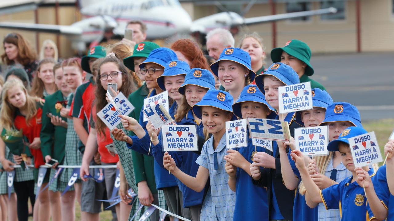 Local school kids nervously waiting to meet the royal couple. Picture: Toby Zerna