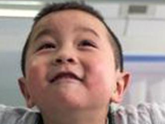 Pic shows: Toddler Xiaofeng is learning to walk againg after being fitted with his first pair of temporary prosthetics. A double amputee toddler, who shot to fame and won the hearts of the nation when he danced to a famous Chinese pop song, is learning to walk again after being fitted with his first pair of temporary prosthetics. Brave Four-year-old Xiaofeng had both his legs amputated, following a car accident two years ago in his hometown of Enshi, a city in central Chinaâ€™s Hubei Province. After multiple operations, he is now undergoing rehabilitation with prosthetics. In March, Xiaofeng was transferred to the Disabled Rehabilitation Center in provincial capital Wuhan, where physicians have been preparing him to walk once more. Doctors said Xiaofeng, who cried when doctors fitted plaster on his legs to make a mould for his prosthetics, has been more at ease at the rehabilitation centre, as the crowded hospital where he had his operations often made him nervous and quiet. The boy who moved people across China when he danced to the famous Chopstick Brothers pop song 