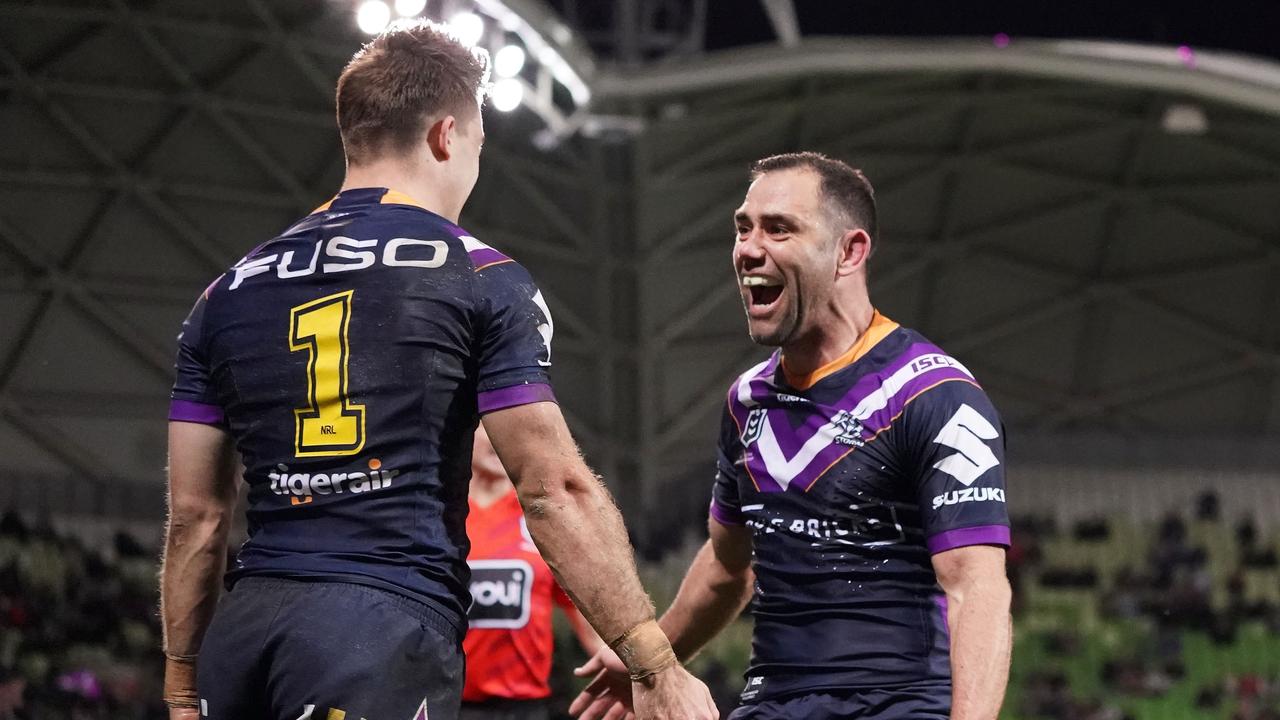 Ryan Papenhuyzen of the Melbourne Storm is congratulated by Cameron Smith