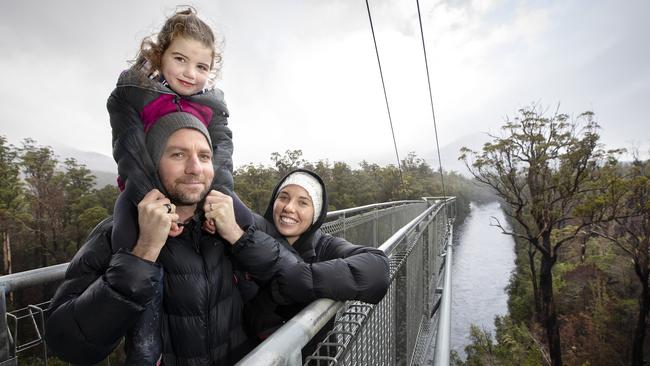 Dale, Bronwyn and Abigail Moran 4 of Franklin at Tahune Adventures Tasmania during the school holidays. Picture Chris Kidd