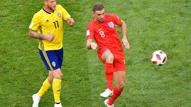 Jordan Henderson (right) in action for England against Sweden in their World Cup quarter-final. Photo: AFP