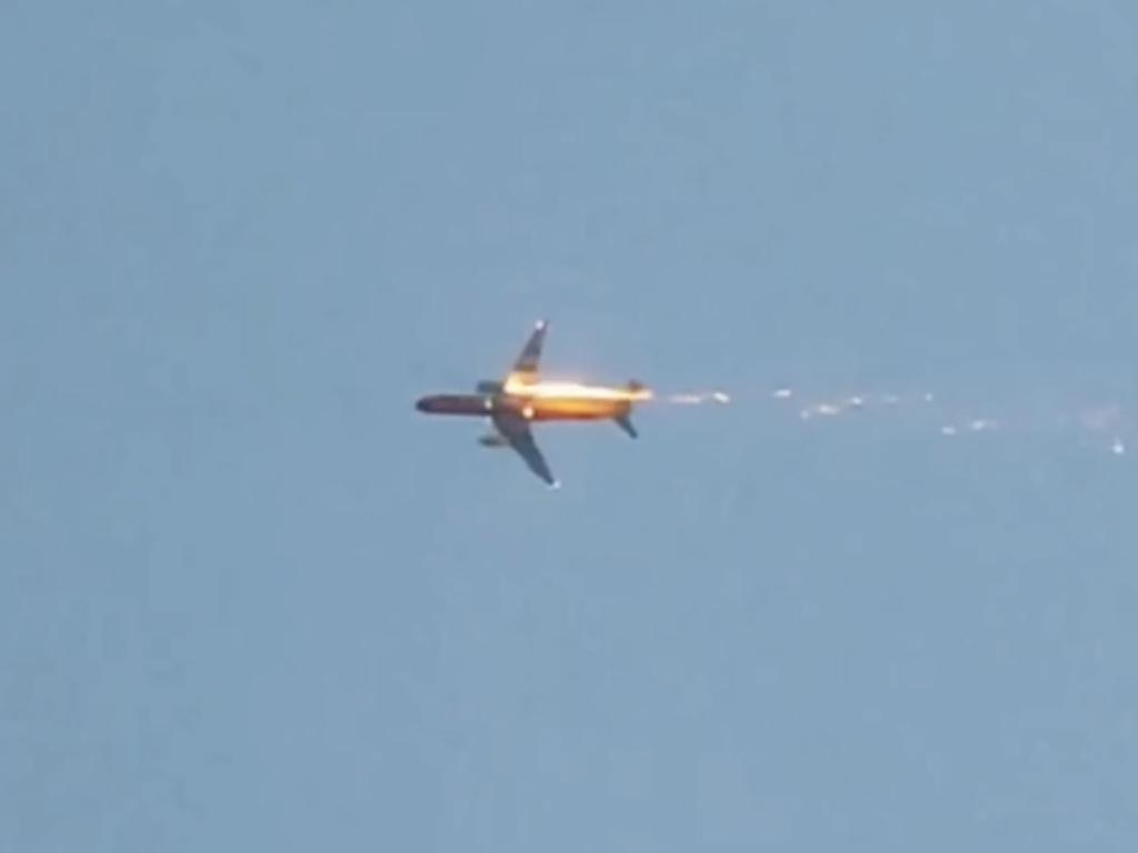 The plane’s left engine caught fire after the explosion. Picture: East 2 West News