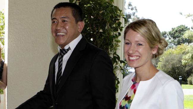 Happy family ... Anh Do and his wife Suzanne were among a select group of guests who lunched with Queen Elizabeth at Government House in 2011. Picture: Ray Strange.