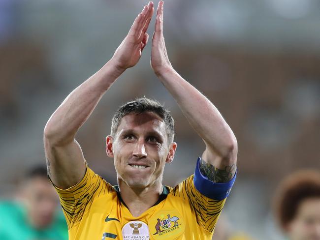 AL AIN, UNITED ARAB EMIRATES - JANUARY 21: Mark Milligan of Australia celebrates following his sides victory in the AFC Asian Cup round of 16 match between Australia and Uzbekistan at Khalifa Bin Zayed Stadium on January 21, 2019 in Al Ain, United Arab Emirates. (Photo by Francois Nel/Getty Images)