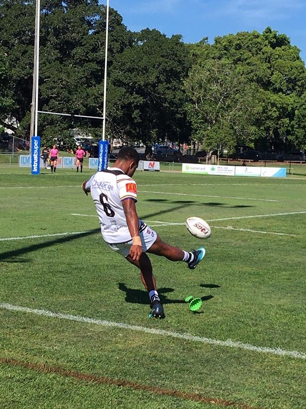 Ezra Mam kicking for goal for Souths Logan.