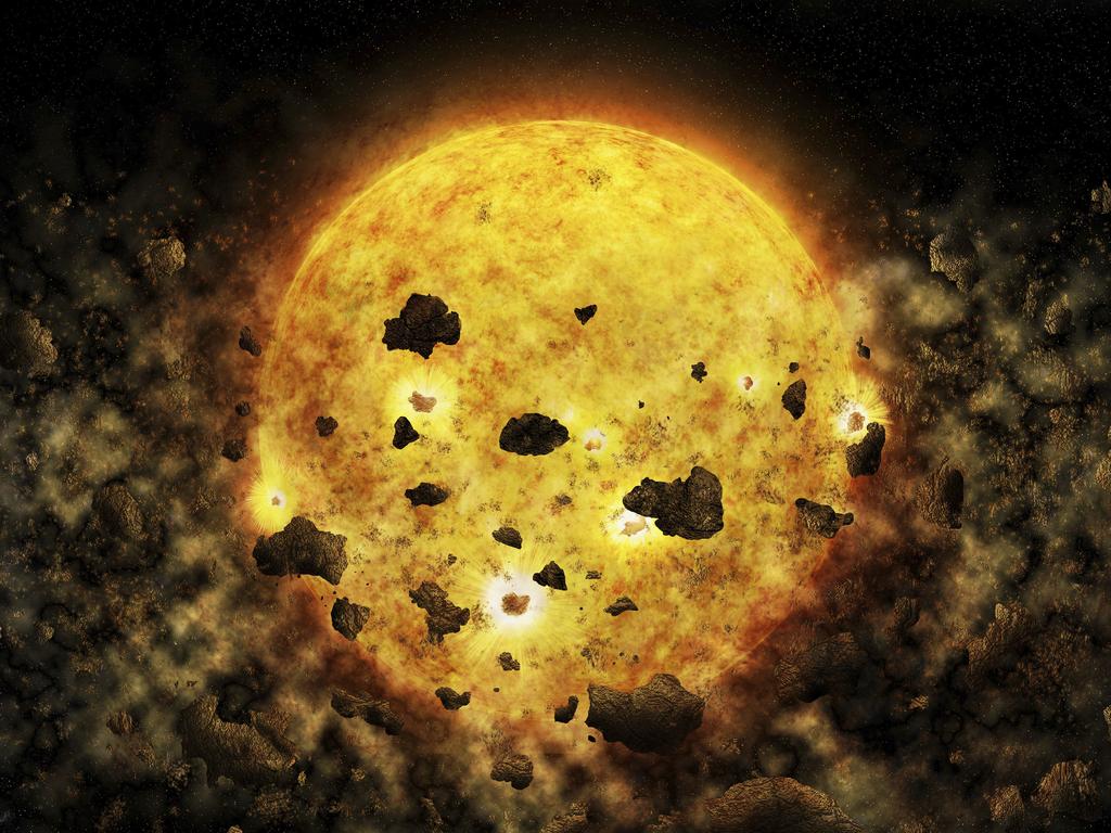 This illustration provided by NASA depicts debris surrounding the star RW Aur A, about 450 light-years away from the Earth. In the Wednesday, July 18, 2018 edition of the Astronomical Journal, astronomers said they may have caught the star munching on a planet or mini-planets. (M. Weiss/CXC/NASA via AP)