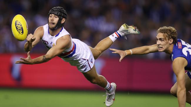 Caleb Daniel gets a handball away for the Bulldogs. Picture: Michael Klein