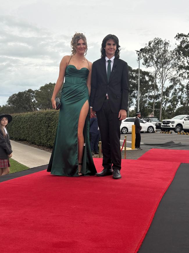 The students of Urangan State High School arriving at their formal.