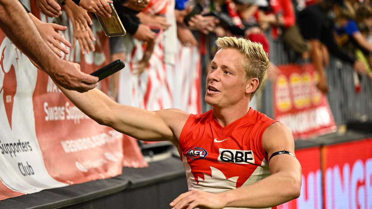 Isaac Heeney celebrates the Swans’ latest win with the fans. Picture: AFL Photos via Getty Images