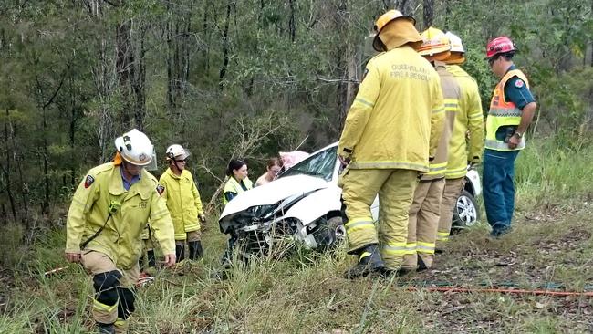 Emergency services at the scene of a single vehicle accident on the Nerang-Murwillumbah Road at Clagiraba. Photo: Aaron Doon.