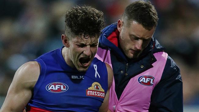 Tom Liberatore injured. Picture: Wayne Ludbey