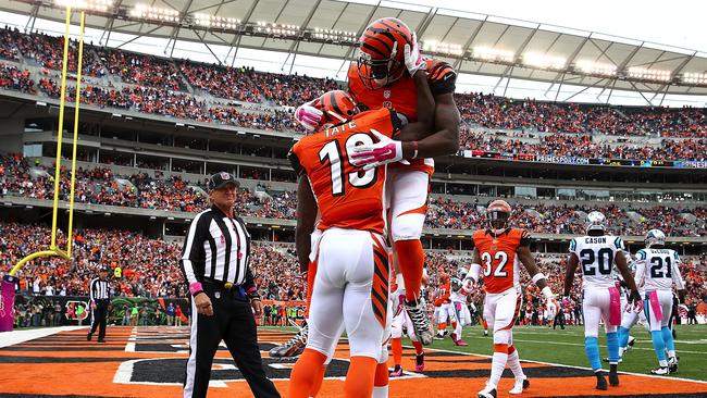 Mohamed Sanu congratulates Brandon Tate after scoring a touchdown.