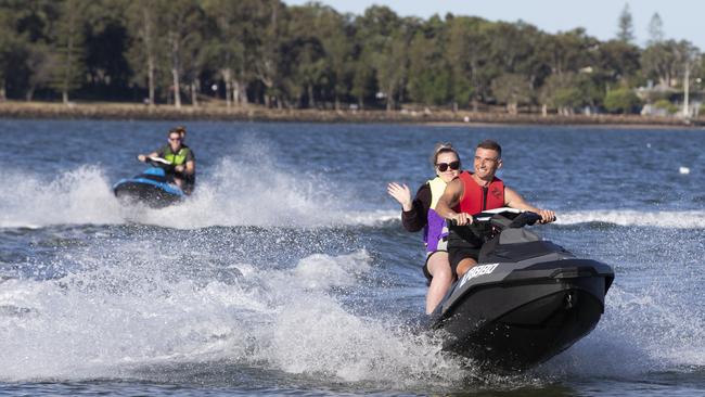 Relaxed COVID -19 restrictions allows jetskiers to be out on the water again. Josh Dries with his partner Shanice Jones enjoy the water at Clontarf. Picture: Renae Droop