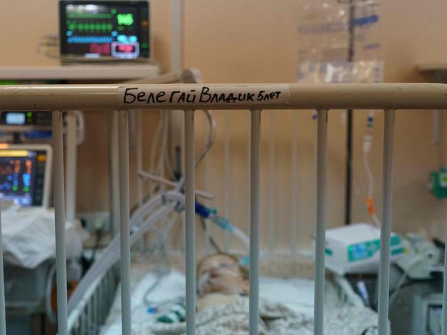 Belegay Vladik, a five-year-old boy from Polohy, receives treatment for severe injuries in a room protected by sandbags at the Zaporizhzhia Regional Clinical Children's Hospital. Picture: Emre Caylak/AFP