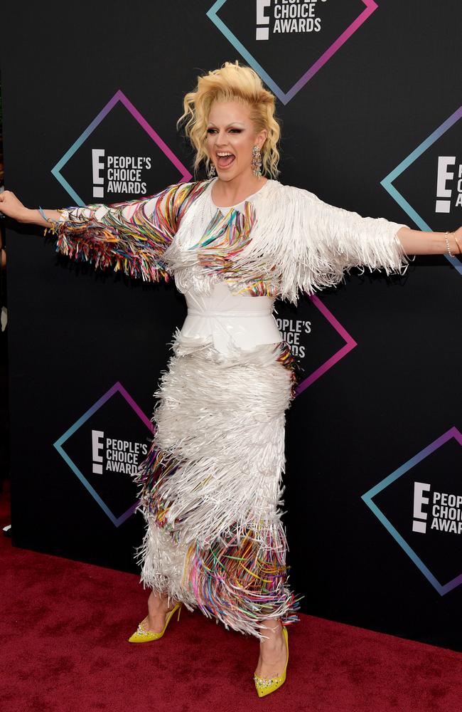 Courtney Act, Australian treasure and, in this outfit, walking feather duster. Picture: Getty