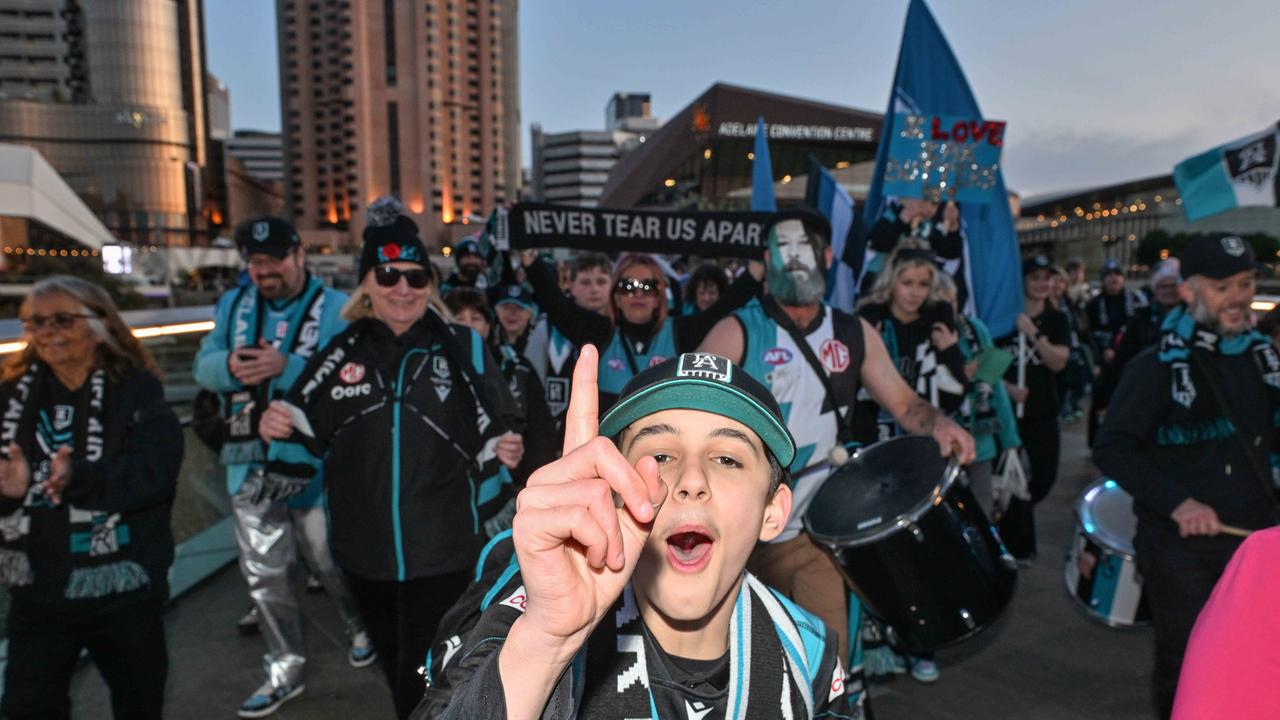 SEPTEMBER 13, 2024: Port Adelaide Army cross the footbridge to the Port v Hawthorn semi final at Adelaide Oval. Picture: Brenton Edwards