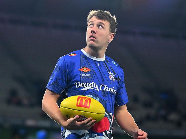 MELBOURNE, AUSTRALIA - MAY 23: Jack Macrae of the Bulldogs warms up ahead of the round 11 AFL match between Western Bulldogs and Sydney Swans at Marvel Stadium, on May 23, 2024, in Melbourne, Australia. (Photo by Morgan Hancock/Getty Images)