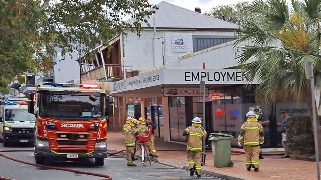 Three teenage boys have been arrested over a shop fire which damaged a Mary St business at the weekend.