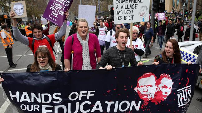 Not happy...Students protest the budget university cuts outside State Library in the city. Picture: Brendan Francis.