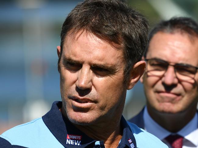 South Australian Premier Steven Marshall is seen with NSW Blues coach Brad Fittler and Maroons Coach Kevin Walters during the The 2020 State of Origin Series launch at Elder Park next to Adelaide Oval in Adelaide, Tuesday, February 4, 2020. (AAP Image/David Mariuz) NO ARCHIVING