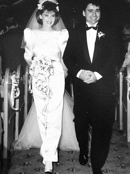 With her husband on their wedding day in 1989.