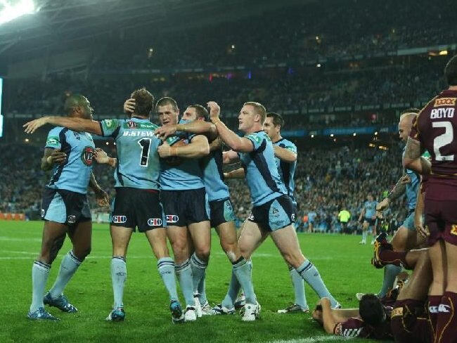 State of Origin II, 2012: NSW celebrate Brett Stewart's first half try. Picture: Brett Costello