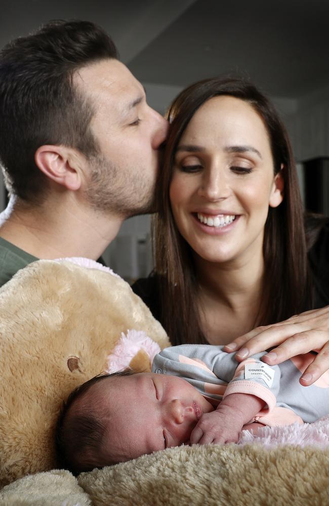 Laura Hodges with her husband Tim and their new baby daughter Ava. Picture Sarah Reed